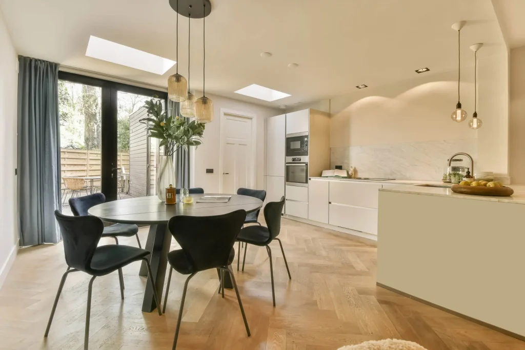 a-kitchen-and-dining-room-with-a-table-and-chairs-2025-02-10-09-08-24-utc